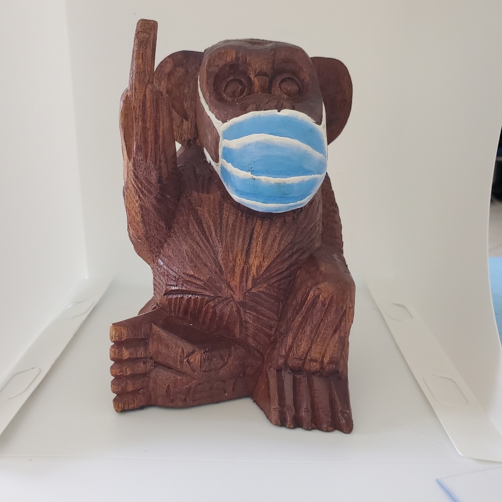 Bad covid monkey carved wood figure